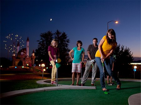 simsearch:640-02951471,k - USA, Utah, Orem, Parents and kids (10-17) playing golf Stock Photo - Premium Royalty-Free, Code: 640-05761137