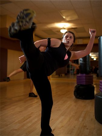 USA, Utah, Draper, Woman exercising in gym Stock Photo - Premium Royalty-Free, Code: 640-05761130