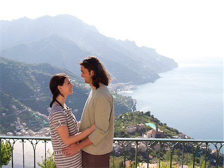 Italy, Ravello, Couple embracing on terrace Stock Photo - Premium Royalty-Free, Code: 640-06049883