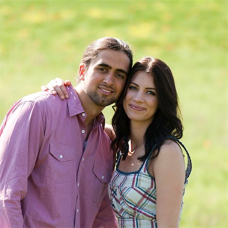 simsearch:640-06050299,k - Italy, Tuscany, Portrait of young couple on meadow Stock Photo - Premium Royalty-Free, Code: 640-06049948