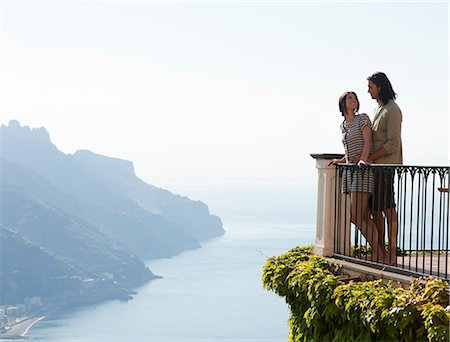 simsearch:640-06050299,k - Italy, Ravello, Young couple standing together at balustrade Stock Photo - Premium Royalty-Free, Code: 640-06049996