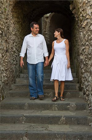 simsearch:640-06049939,k - Italy, Ravello, Couple walking on stairs Stock Photo - Premium Royalty-Free, Code: 640-06050045