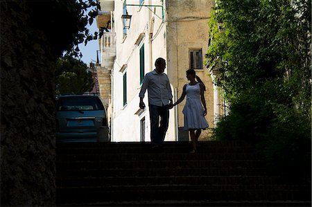 simsearch:640-06049939,k - Italy, Ravello, Couple walking on street of old town Stock Photo - Premium Royalty-Free, Code: 640-06050062