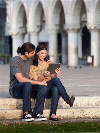 simsearch:640-06050299,k - Italy, Venice, Young couple using digital tablet on St. Mark's Square Stock Photo - Premium Royalty-Free, Code: 640-06050276