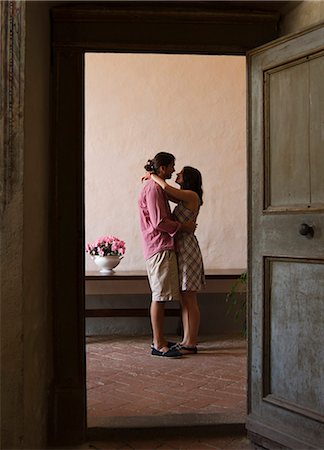 simsearch:640-06050299,k - Italy, Tuscany, Young couple kissing in old house Stock Photo - Premium Royalty-Free, Code: 640-06050284
