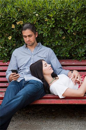 simsearch:640-06050299,k - Italy, Venice, Young couple relaxing on bench Stock Photo - Premium Royalty-Free, Code: 640-06050305