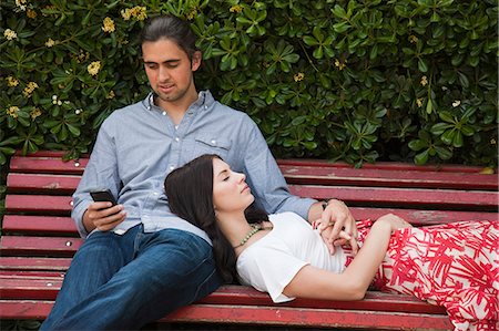 simsearch:640-06050299,k - Italy, Venice, Young couple relaxing on bench Stock Photo - Premium Royalty-Free, Code: 640-06050306