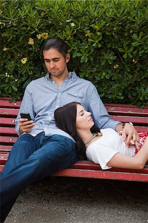 simsearch:640-06050299,k - Italy, Venice, Young couple relaxing on bench Stock Photo - Premium Royalty-Free, Code: 640-06050303