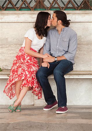 simsearch:640-06050299,k - Italy, Venice, Young couple kissing on bench Stock Photo - Premium Royalty-Free, Code: 640-06050315