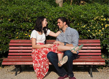 flirting - Italy, Venice, Young couple sitting on bench Stock Photo - Premium Royalty-Free, Code: 640-06050311