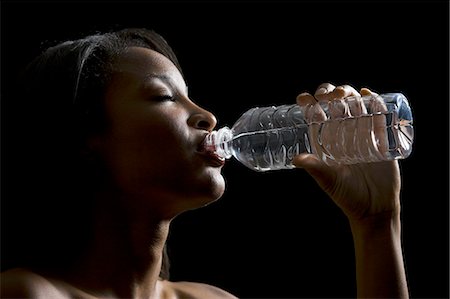 woman drinking water Stock Photo - Premium Royalty-Free, Code: 640-06051162
