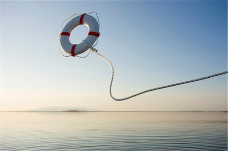 life preserver in the middle of nowhere Stock Photo - Premium Royalty-Free, Code: 640-06051624