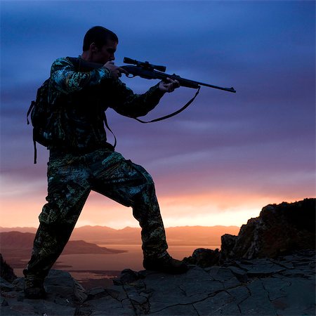 shooting - hunter against a sunset Stock Photo - Premium Royalty-Free, Code: 640-06051636