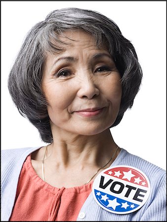 sticker - woman with a "vote" button Stock Photo - Premium Royalty-Free, Code: 640-06051784
