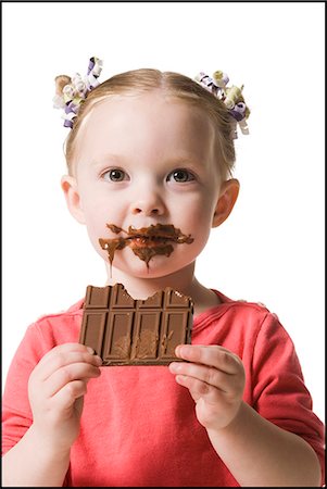 child eating chocolate Stock Photo - Premium Royalty-Free, Code: 640-06051887