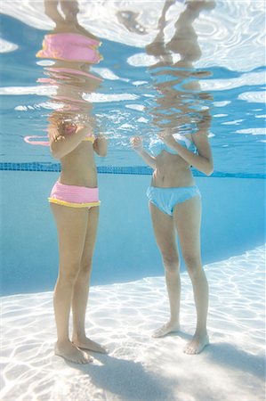 reflecting pool - USA, Utah, Orem, Young women standing under water Stock Photo - Premium Royalty-Free, Code: 640-06963280