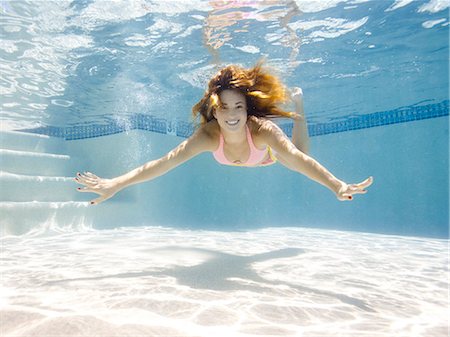 USA, Utah, Orem, Portrait of young woman under water Stock Photo - Premium Royalty-Free, Code: 640-06963281