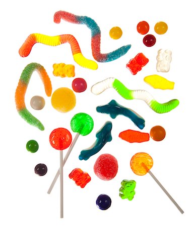 picture of a red lollipop - Colorful sweets on white background forming abstract pattern Stock Photo - Premium Royalty-Free, Code: 640-06963521