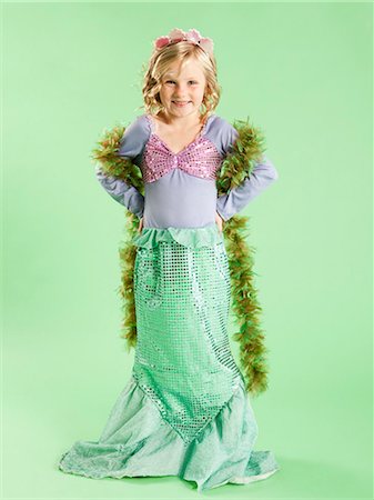 dressed up - Portrait of girl (6-7) in Mermaid costume for Halloween Stock Photo - Premium Royalty-Free, Code: 640-06963597