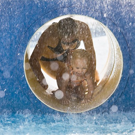 mother and daughter at the waterpark Stock Photo - Premium Royalty-Free, Code: 640-08089172