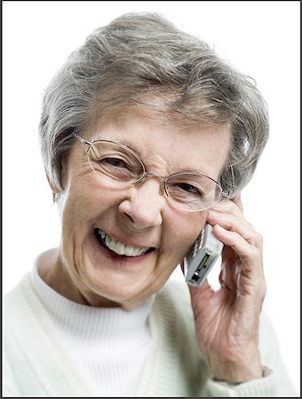 phone one person adult smile elderly - Portrait of a senior woman talking on a mobile phone Stock Photo - Premium Royalty-Free, Code: 640-01348552