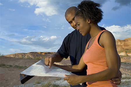 simsearch:640-02764709,k - Profile of a young couple looking at a map Stock Photo - Premium Royalty-Free, Code: 640-01348874