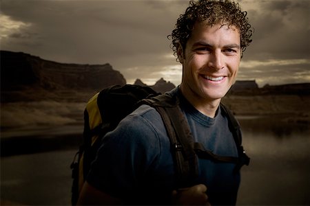simsearch:640-01358229,k - Portrait of a young man carrying a backpack Stock Photo - Premium Royalty-Free, Code: 640-01348930