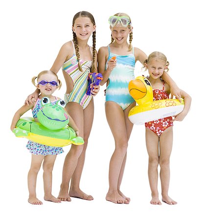 Young sisters in swimsuits on vacation Stock Photo - Premium Royalty-Free, Code: 640-01349024