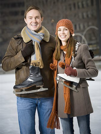 Couple with skates outdoors in winter Stock Photo - Premium Royalty-Free, Code: 640-01349043