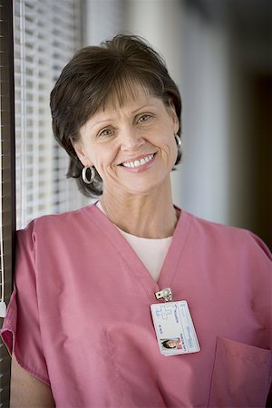 simsearch:640-01364042,k - Portrait of a female nurse smiling Stock Photo - Premium Royalty-Free, Code: 640-01349203