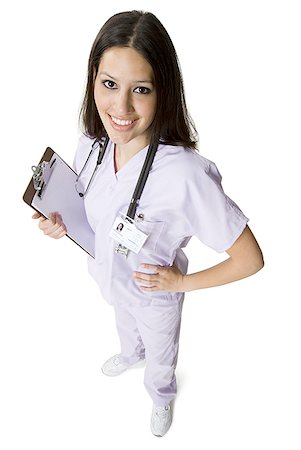 simsearch:640-01364042,k - High angle view of a female nurse holding a clipboard Stock Photo - Premium Royalty-Free, Code: 640-01349286
