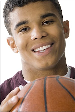 simsearch:640-01349238,k - Close-up of a young man holding a basketball Stock Photo - Premium Royalty-Free, Code: 640-01349455