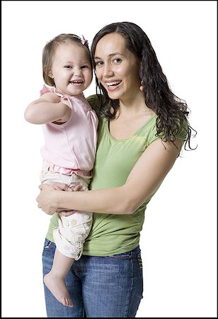 Portrait of a young woman carrying her daughter Stock Photo - Premium Royalty-Free, Code: 640-01349481