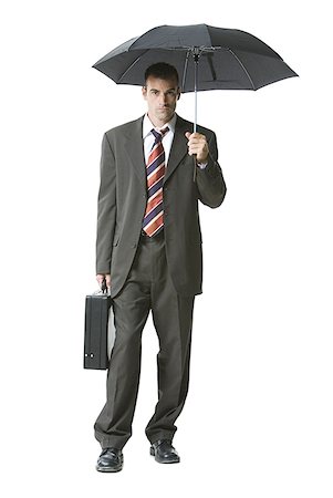 simsearch:640-01357365,k - Portrait of a businessman holding a briefcase and an umbrella Stock Photo - Premium Royalty-Free, Code: 640-01349919