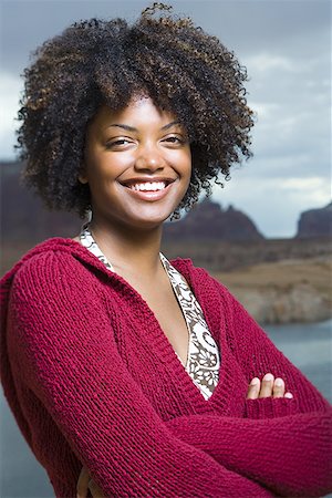 simsearch:640-01358229,k - Close-up of a young woman smiling Stock Photo - Premium Royalty-Free, Code: 640-01354283
