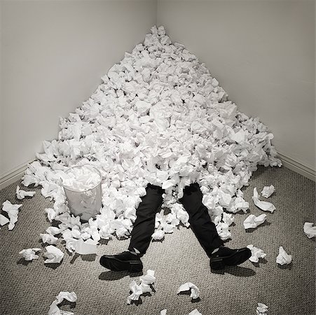 exhaust - Businessman buried in mountain of crumpled papers Stock Photo - Premium Royalty-Free, Code: 640-01354346