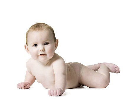simsearch:640-01359777,k - Portrait of a baby boy lying on the floor Stock Photo - Premium Royalty-Free, Code: 640-01354395
