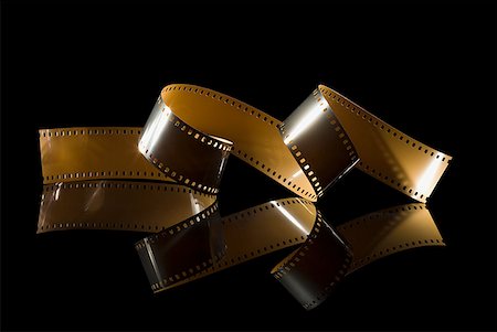 film reel - Coiled film strip Stock Photo - Premium Royalty-Free, Code: 640-01354431