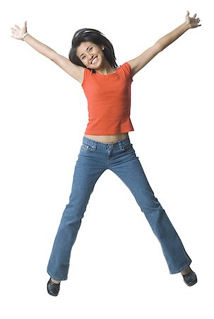 simsearch:640-01349238,k - Portrait of a young woman jumping Stock Photo - Premium Royalty-Free, Code: 640-01354467