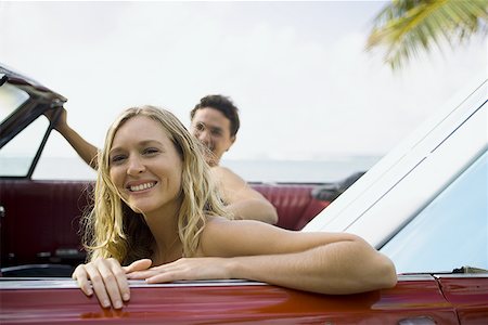 surfboard close up - Portrait of a young couple sitting in a car Stock Photo - Premium Royalty-Free, Code: 640-01354686