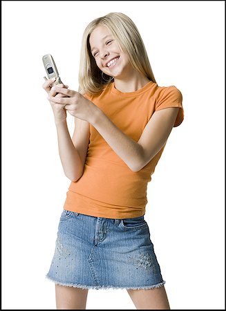 Close-up of a girl operating a mobile phone Stock Photo - Premium Royalty-Free, Code: 640-01354863