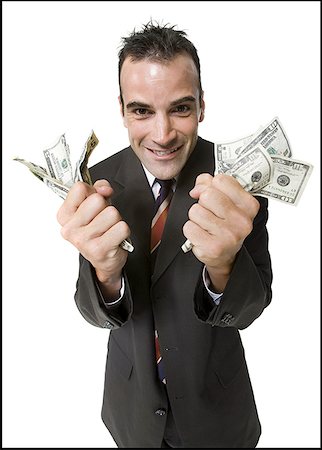 simsearch:640-01357365,k - Businessman holding fists full of money Stock Photo - Premium Royalty-Free, Code: 640-01354977