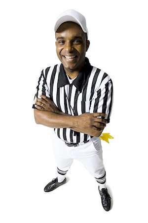 referee - Referee standing with arms crossed Stock Photo - Premium Royalty-Free, Code: 640-01355371