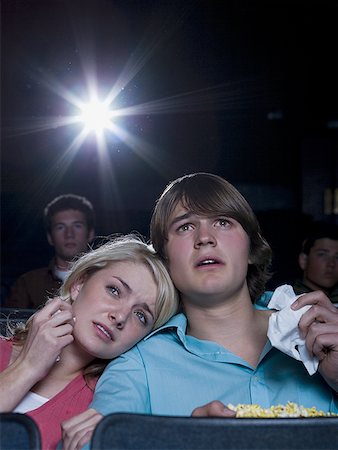 simsearch:640-02773406,k - Boy and girl with tissues crying at movie theater Stock Photo - Premium Royalty-Free, Code: 640-01355560