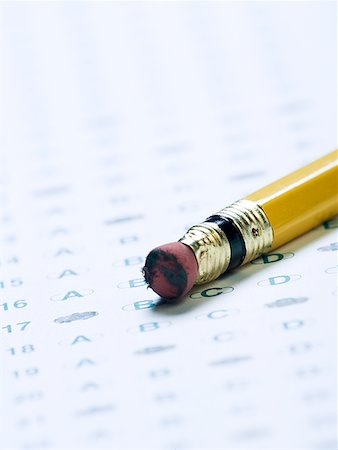 Close-up of a pencil on a test form Stock Photo - Premium Royalty-Free, Code: 640-01355592