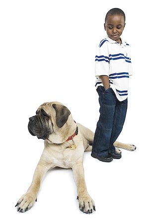 simsearch:640-01359777,k - Profile of a boy standing near a dog Stock Photo - Premium Royalty-Free, Code: 640-01355863