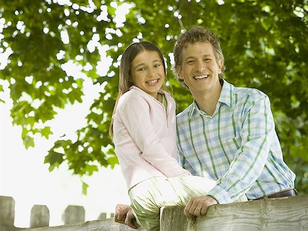 simsearch:6113-07242957,k - Portrait of a man and his daughter smiling Stock Photo - Premium Royalty-Free, Code: 640-01356042