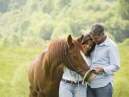simsearch:640-01356213,k - Mature man and a woman with a horse Stock Photo - Premium Royalty-Free, Code: 640-01356213