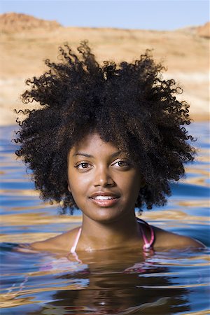 simsearch:640-01358229,k - Portrait of a young woman in a lake Stock Photo - Premium Royalty-Free, Code: 640-01356382