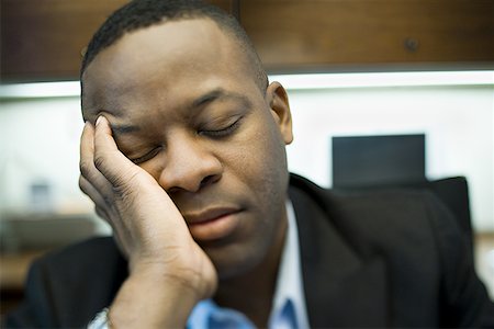 sleeping in class pictures blacks - Close-up of a businessman sleeping with his head in his hands Stock Photo - Premium Royalty-Free, Code: 640-01356661